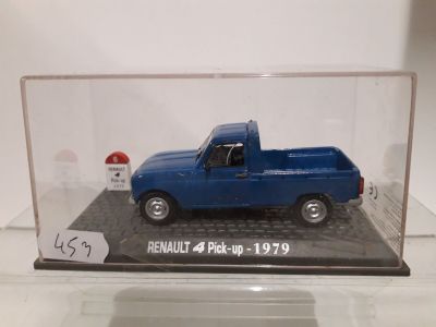 a blue toy truck in a clear display case