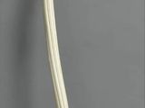 a white lamp that is sitting on a table