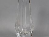 a clear glass vase that is sitting on a table
