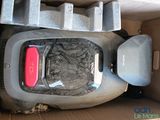 a vacuum that is sitting in a box on the floor