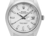 the rolex oyster oyster oyster white dial watch is on a stainless steel bracelet