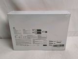 the back of a white box with a black label on it