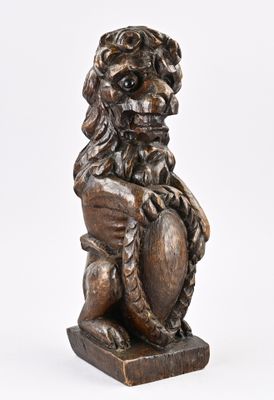 une image représentant une statue de lion tenant un bouclier