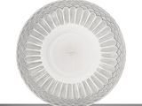 a white plate that is sitting on a table