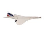 un modèle réduit d'avion qui vole dans le ciel