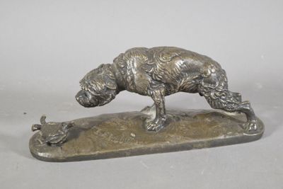 bronze statue of a dog and a duck on a stone base