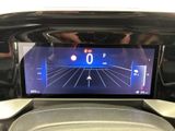 an image of a car ' s dashboard with a digital display