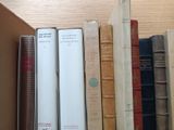 many books that are on a shelf together