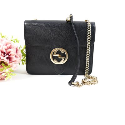 guccissi black leather cross body bag with chain strap