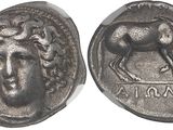 a close up of a coin with a horse on it