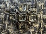 an image of a close up of a watch on a cloth