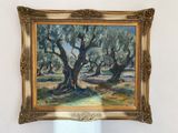 tableau représentant des oliviers, dans un cadre doré, accroché au mur