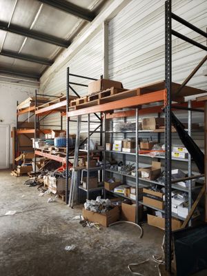a room with a lot of shelves in it