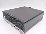 an image of a small computer on a white surface