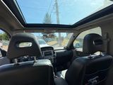 a view of the inside of a car from the driver ' s seat