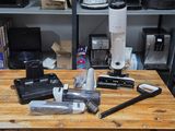 a wooden table with a bunch of items on top of it