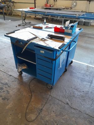 an image of a workbench in a factory with tools on it