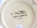 a close up of a white plate with writing on it