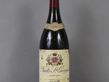 a bottle of wine that is sitting on a table