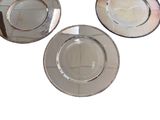 three plates that are sitting next to each other on a table