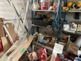 a pile of boxes and other items in a room