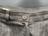 a close up of a man ' s pants with a button on it