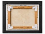 a black and white picture frame with a picture of a cat