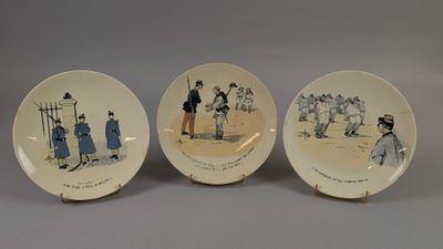 three porcelain plates with pictures of people on them sitting on a table