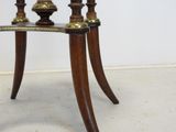 an image of a wooden table with two legs and a glass top