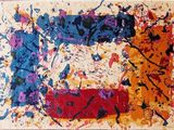 peinture abstraite représentant des éclaboussures de peinture multicolores sur une surface blanche