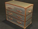 a chest of drawers that is made of wood and metal