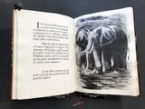 an open book with a drawing of an elephant on it