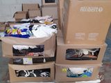 a pile of boxes and a bike helmet on a pallet