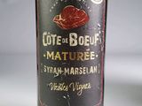 a bottle of wine that is sitting on a table