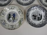 four plates with pictures of people on them sitting on a table