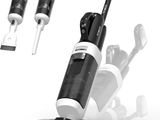 a black and white photo of a vacuum and three other vacuums