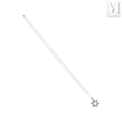 an image of a necklace with a star of david on it