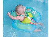 a baby that is floating in the water on a raft