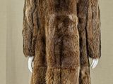 an image of a mannequin wearing a fur coat on a mannequin mannequin