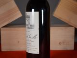 a bottle of wine that is sitting on a table