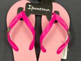 a pair of pink flip flop flop flop flop flop flop flop flop flop flop flop flop flop flop flop flop
