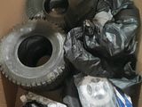 a box full of tires and other items in it