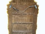 a picture of a wooden door with wires attached to it