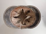an overhead view of a helmet with a star on the side
