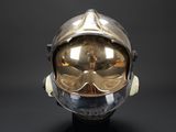 an image of a helmet with goggles on a black background