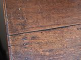 a close up of a piece of wood on a table