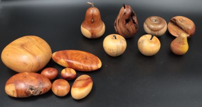 many different types of nuts on a black surface