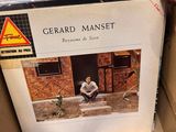 a person holding a record in a cardboard box
