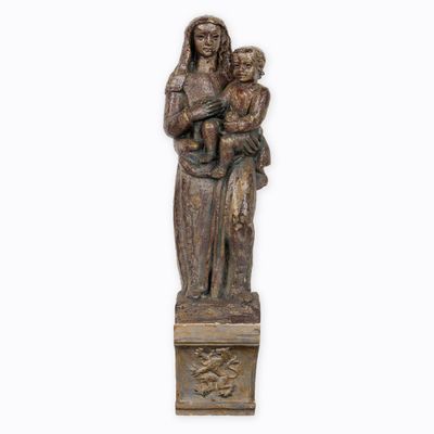 an image of a statue of a woman holding a child