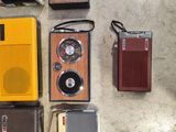many different types of radio on the table